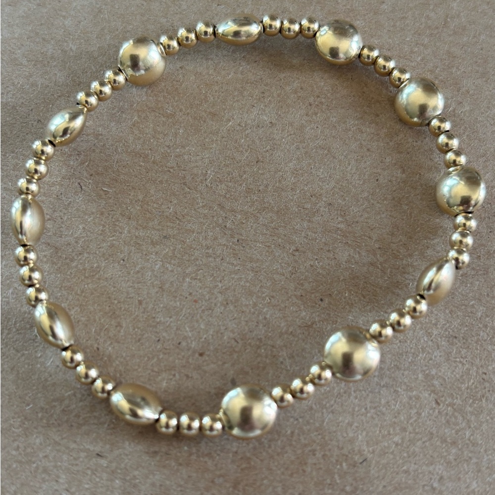 Like new enewton gold bracelet